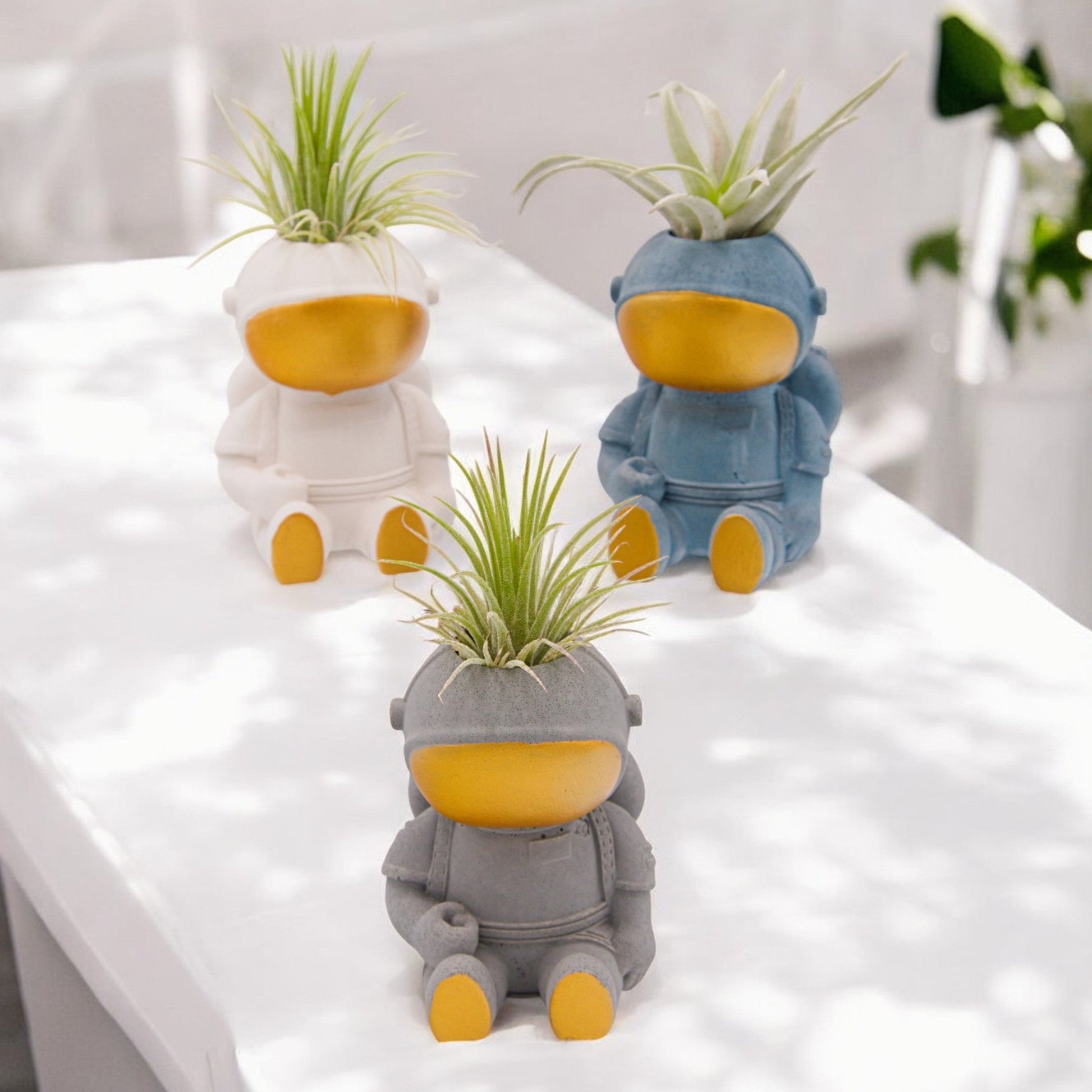 Handmade astronaut airplant pots