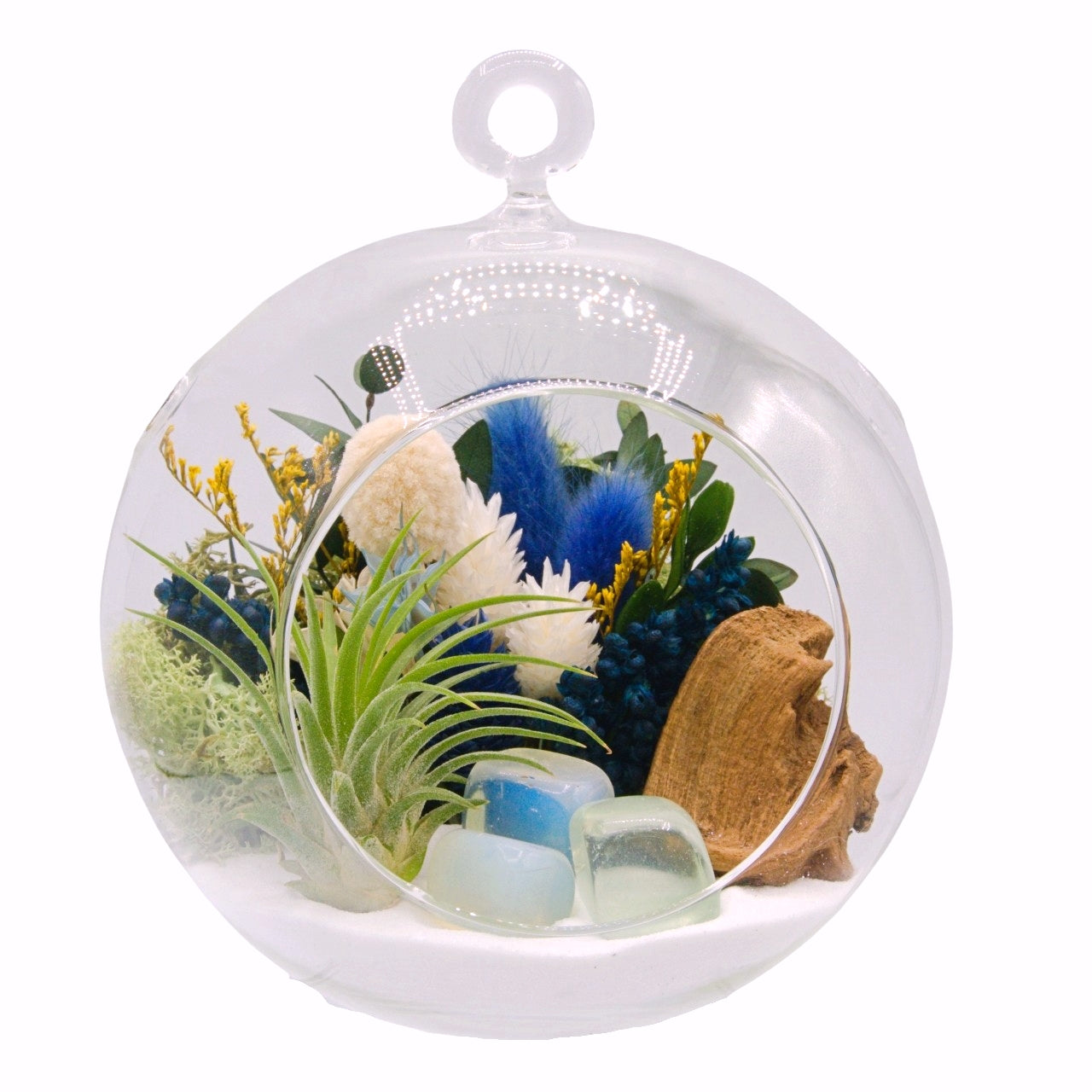 airplant terrarium with dried flowers and three opalite crystals