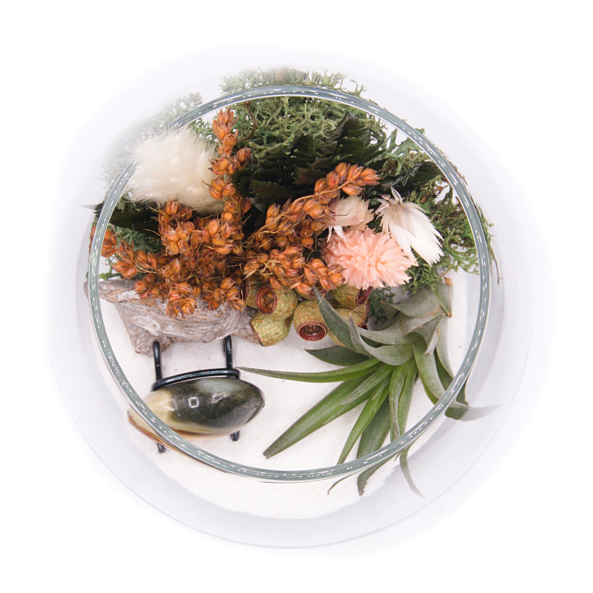 Glass bowl airplant terrarium with a bouquet of dried flowers, moss, wood and a jasper heart stone